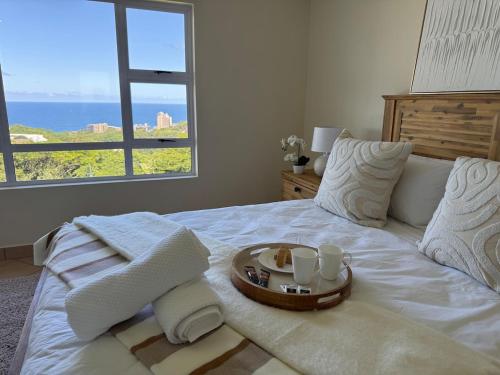 Ένα ή περισσότερα κρεβάτια σε δωμάτιο στο Belair Signature No7 Ballito BHE