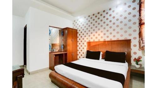 Ένα ή περισσότερα κρεβάτια σε δωμάτιο στο Le ALFANSO BY AZAD RAM