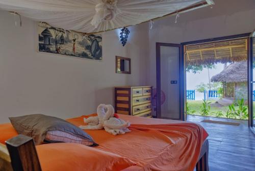 Postel nebo postele na pokoji v ubytování La Vie Est Belle