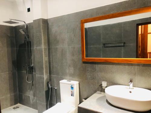 Ένα μπάνιο στο Villa Balcony Bliss