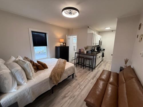 Ένα ή περισσότερα κρεβάτια σε δωμάτιο στο Aqua Amour Studio