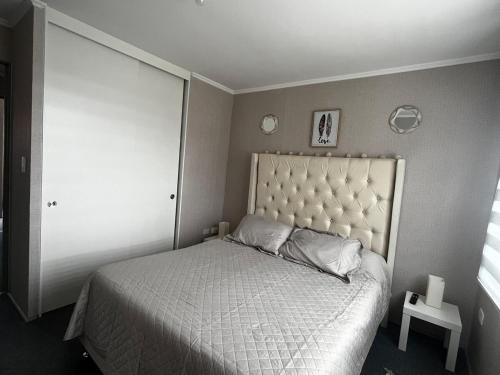 Postel nebo postele na pokoji v ubytování Casa 3D 1B en Coquimbo