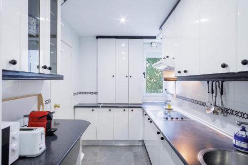 Køkken eller tekøkken på Apartamento Aeropuerto Sevilla