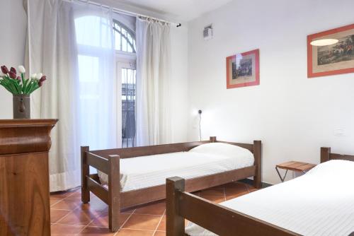 Postel nebo postele na pokoji v ubytování Casetta Gialla