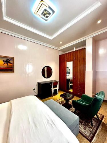 Giường trong phòng chung tại Avrum Apartments