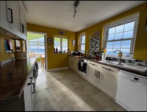 Η κουζίνα ή μικρή κουζίνα στο Lighthouse Keepers Cottage