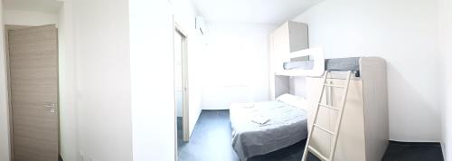 Ein Bett oder Betten in einem Zimmer der Unterkunft Siderno Beach Stay - Guest House