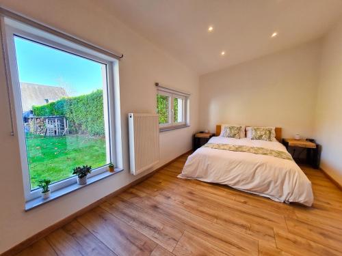 Ένα ή περισσότερα κρεβάτια σε δωμάτιο στο Ô Jardin