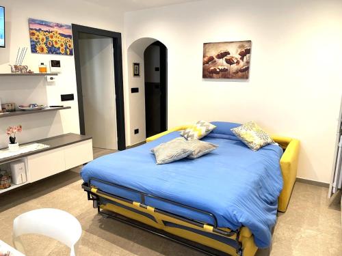 Una cama o camas en una habitación de Appartamento Pineta casa vacanze Sci & Natura