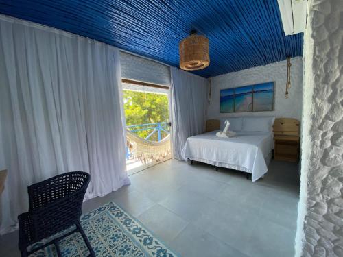 En eller flere senge i et værelse på Hotel Boutique Silvano Gourmet