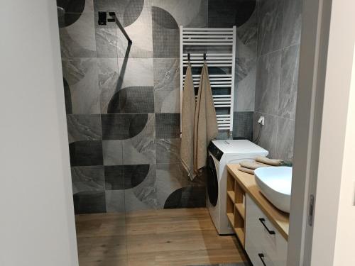 Ένα μπάνιο στο MODERN APARTAMENT Walendów Park