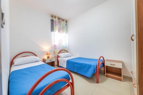 Ένα ή περισσότερα κρεβάτια σε δωμάτιο στο casa relax