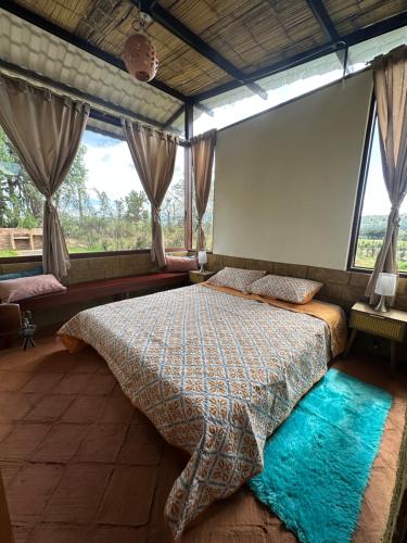 Ένα ή περισσότερα κρεβάτια σε δωμάτιο στο Villas de Sutamarchan