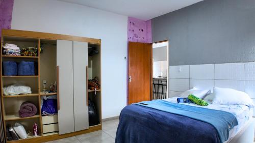 En eller flere senge i et værelse på Residencial Vila Marambaia Itacaré