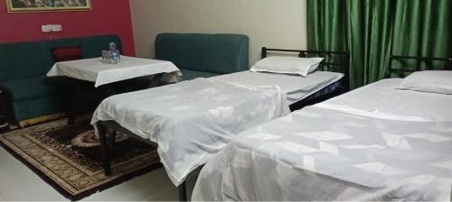 Postel nebo postele na pokoji v ubytování Junglee Valley Holiday Home