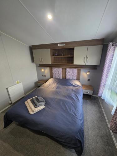 Una cama o camas en una habitación de H05 Par Sands