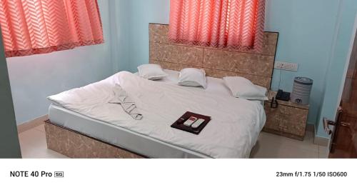 Postel nebo postele na pokoji v ubytování Pushkar Prime Resort