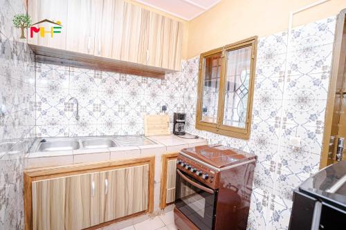 Ett kök eller pentry på Amour