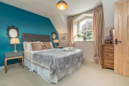 Postel nebo postele na pokoji v ubytování Neuadd-Dolwyddelan