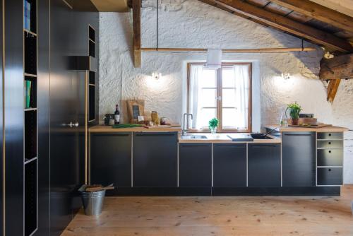 Kuchyň nebo kuchyňský kout v ubytování Gästehaus berge Ferienwohnungen