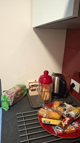 a table with a plate of food on a counter at Novecento in Bertinoro