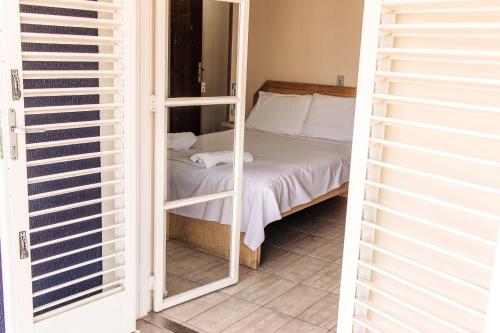 Postel nebo postele na pokoji v ubytování Hotel Nivs