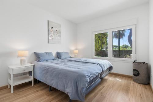 Postel nebo postele na pokoji v ubytování Modern apartment near the beach in Riviera del Sol