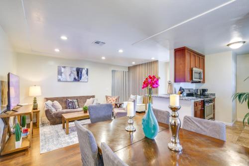 a kitchen and living room with a table and chairs at 1 Mi to Gaylord Resort and Bayfront Updated Duplex in Chula Vista
