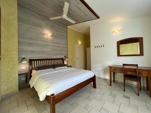 Ένα ή περισσότερα κρεβάτια σε δωμάτιο στο Rossofiore