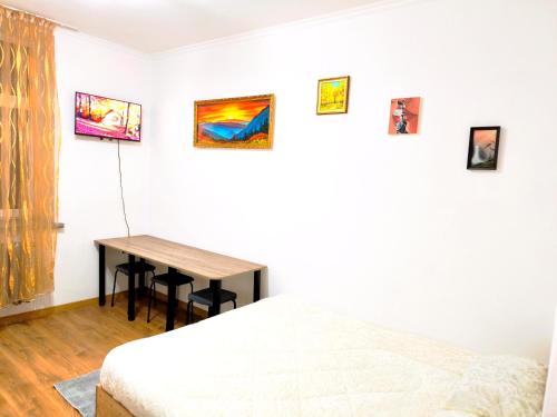 Voodi või voodid majutusasutuse Parcul Ștefan cel mare toas