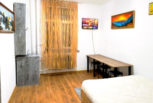 Televiisor ja/või meelelahutuskeskus majutusasutuses Parcul Ștefan cel mare