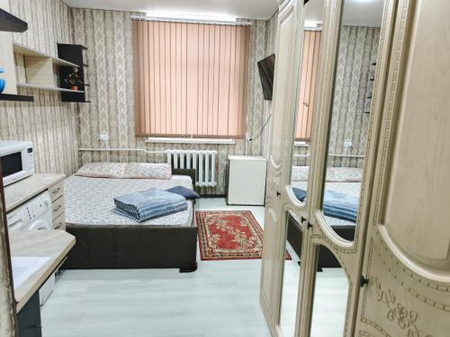 Postel nebo postele na pokoji v ubytování Parcul Ștefan cel mare și sfânt