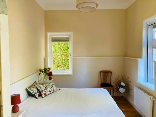 Ένα ή περισσότερα κρεβάτια σε δωμάτιο στο Idyllic Vacation Home In The Elbe Floodplains