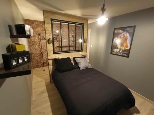 Ένα ή περισσότερα κρεβάτια σε δωμάτιο στο Graon de bonheur