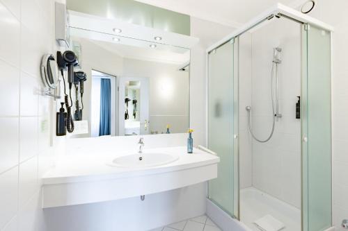 Ένα μπάνιο στο Garner Hotel Post Aschaffenburg by IHG