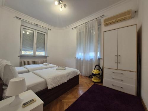 Katil atau katil-katil dalam bilik di Dositej 5 Apartment