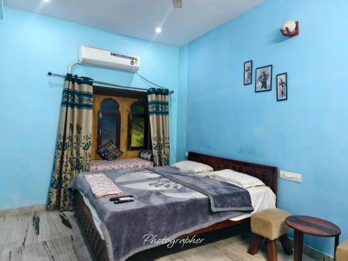 Postel nebo postele na pokoji v ubytování fort view palace