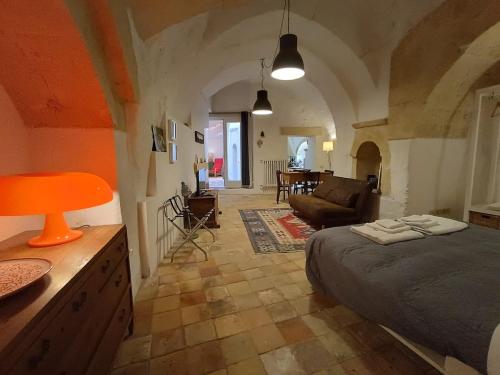 Voodi või voodid majutusasutuse In Via Rosario - Ipogeo Holiday Home toas