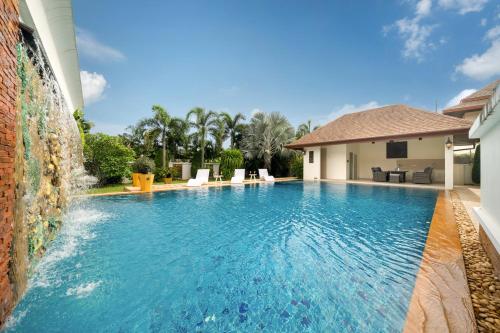 an image of a swimming pool in a house at Villa with Huge Private Pool and Tropical Garden Just 10 Minutes Walk to Kamala Beach in Kamala Beach
