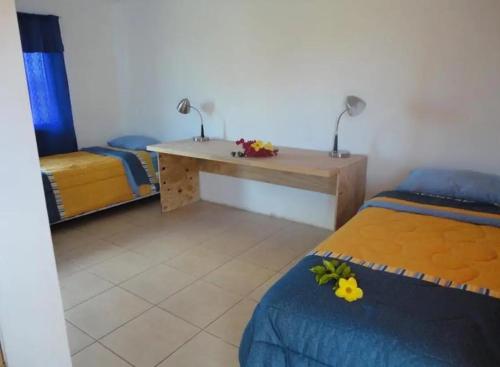 Ένα ή περισσότερα κρεβάτια σε δωμάτιο στο Cabañas Refugio Arqueologico