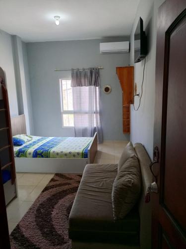 Ένα ή περισσότερα κρεβάτια σε δωμάτιο στο Departamento Comuna San José