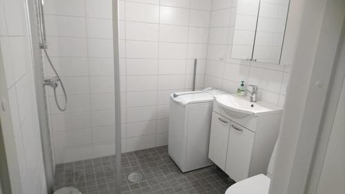 Koupelna v ubytování Helppoa lomailua