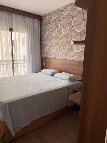 Postel nebo postele na pokoji v ubytování Flat Mercure São Caetano Perfeito para sua Estadia