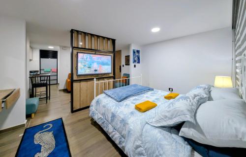 Giường trong phòng chung tại Lienzo Suite