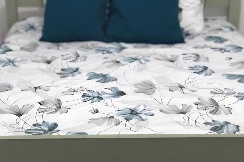 Ένα ή περισσότερα κρεβάτια σε δωμάτιο στο Charming House Secret Rose