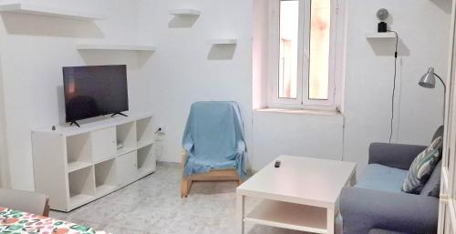 Un televizor și/sau centru de divertisment la Marvelous flat in the city center