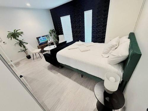 Ένα ή περισσότερα κρεβάτια σε δωμάτιο στο Inkstone Studio