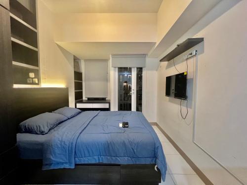 Ένα ή περισσότερα κρεβάτια σε δωμάτιο στο Engel House at Tokyo Riverside Apartment