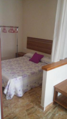 Ένα ή περισσότερα κρεβάτια σε δωμάτιο στο Apartamento Bloque 3