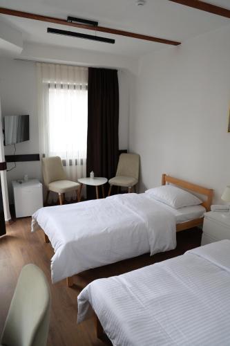 Voodi või voodid majutusasutuse LIMMARE Rooms toas